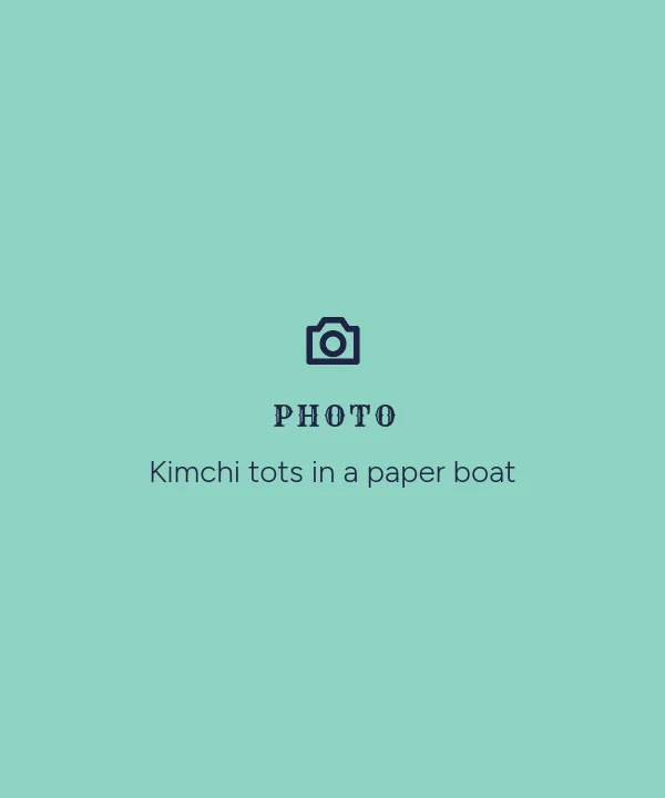 Photo placeholder: Kimchi tots in a paper boat