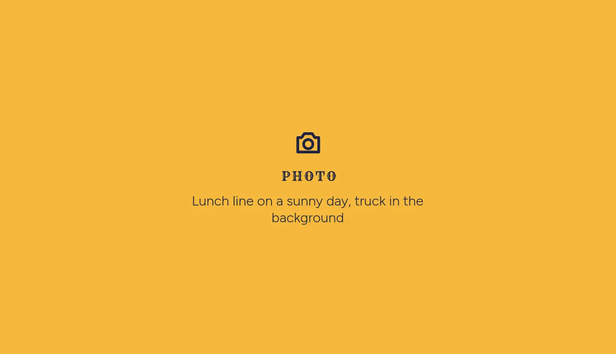 Photo placeholder: Lunch line on a sunny day, truck in the background